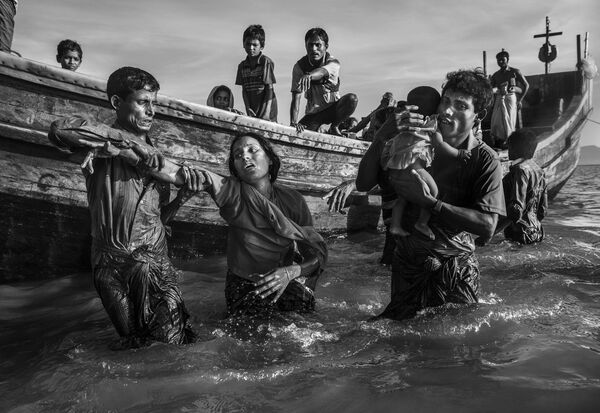 عکس « فرار پناهجویان روهینگیا» از شاه پوریر دویپ از کانادا - اسپوتنیک ایران  