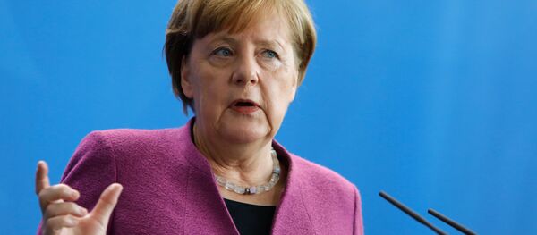 سخنان مرکل درباره خروج شرکت های اروپایی از ایران سخنان مرکل درباره خروج شرکت های اروپایی از ایران - اسپوتنیک ایران