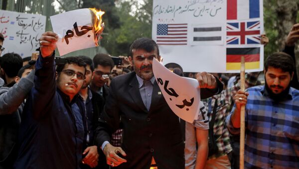 تظاهرات اعتراضی در تهران علیه خروج آمریکا از برجام+ ویدیو - اسپوتنیک ایران  