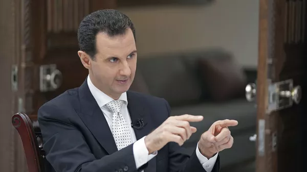اسد: همچنان به تلاش برای محافظت از تروریست ها ادامه می دهند - اسپوتنیک ایران  