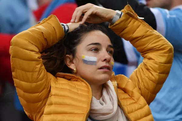 دنیا بر گونه های هواداران جام جهانی روسیه.هوادار اوروگوئه - اسپوتنیک ایران  