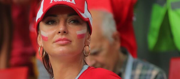 هوادار تیم ملی لهستان در بازی لهستان و سنگال هوادار تیم ملی لهستان در بازی لهستان و سنگال - اسپوتنیک ایران