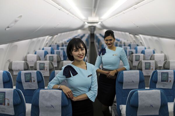 مهمانداران شرکت هواپیمایی SilkAir در فرودگاه سنگاپور - اسپوتنیک ایران  