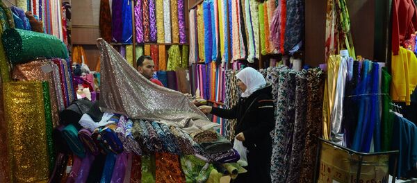 فروش مانتو با استفاده از الیاف پشه بند +عکس - اسپوتنیک ایران  