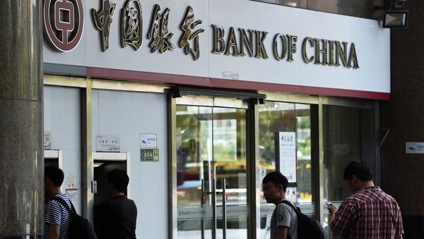 بانک مرکزی چین به عنوان اولین بانک آسیایی به تشریفات تعیین قیمت طلا راه یافت - اسپوتنیک ایران  