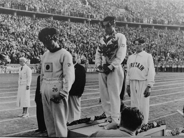 ورزشکاران کره ای که مجبور شدند با پرچم ژاپن بازی کنند - اسپوتنیک ایران  