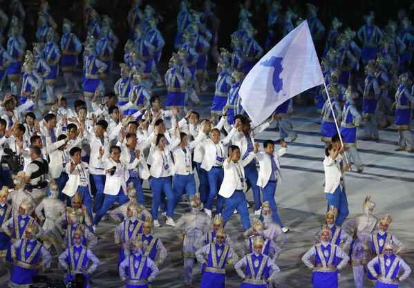 ورزشکاران تیم کره در مراسم افتتاح بازی های آسیایی 2018 در اندونزی - اسپوتنیک ایران  