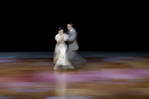 مسابقه قهرمانی رقص تانگو در آرژانتین-زوج آرژانتینی فدریکو ایبانز و نوریه لازو - اسپوتنیک ایران  
