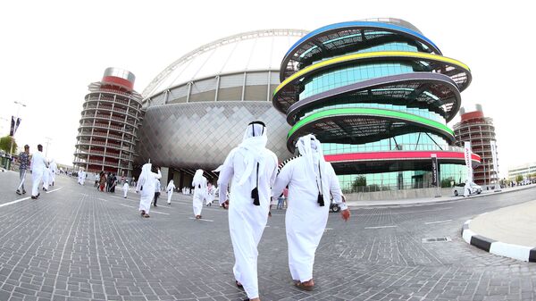 A picture taken with a fisheye lens on May 19, 2017, shows a general view of the Khalifa International Stadium in Doha, after it was refurbished ahead of the Qatar 2022 FIFA World Cup, as fans arrive to attend the Qatar Emir Cup Final football match between Al-Sadd and Al-Rayyan - اسپوتنیک ایران  