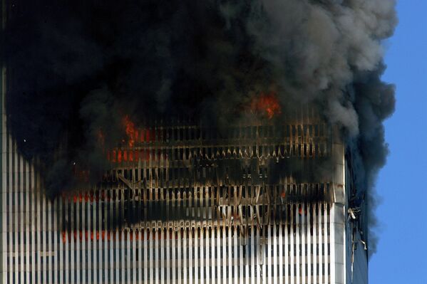 آتش سوزی در محل ساختمان مرکز تجارت جهانی 11 سپتامبر 2001 در نیویورک - اسپوتنیک ایران  