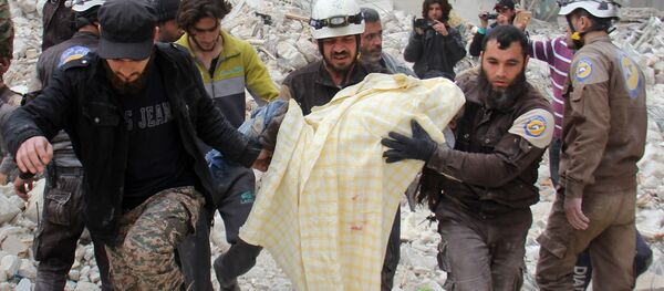 Активисты движения Белые каски в Сирии в Идлибе Активисты движения Белые каски в Сирии в Идлибе - اسپوتنیک ایران