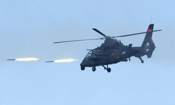 Ударный вертолет Z-19 армии КНР на забайкальском полигоне Цугол, где проходит основной этап военных учений Восток-2018 - اسپوتنیک ایران  