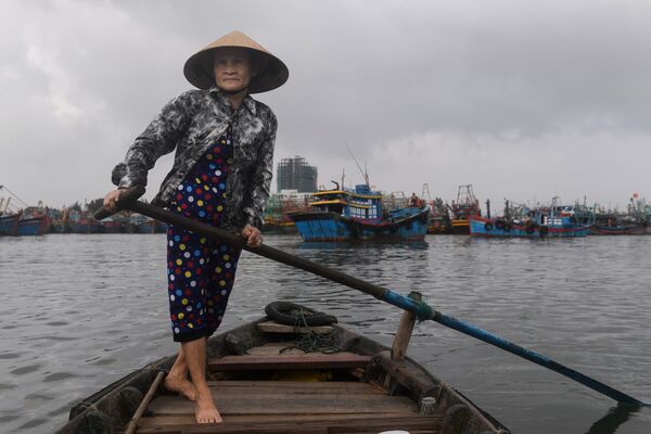 جشن ویژه زنان ویتنام -زن ویتنامی قایقران - اسپوتنیک ایران  