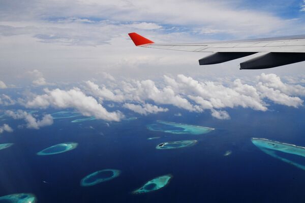 هواپیما در آسمان جزیره های مالدیو - اسپوتنیک ایران  