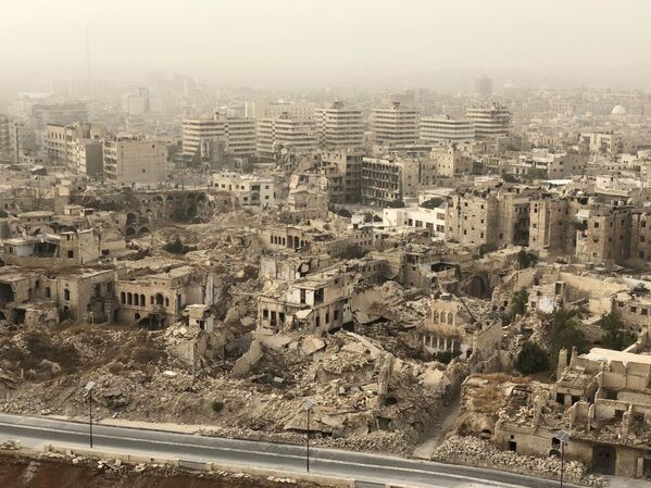 خرابی و آسیب ساختمان ها در حلب در نتیجه جنگ - اسپوتنیک ایران  