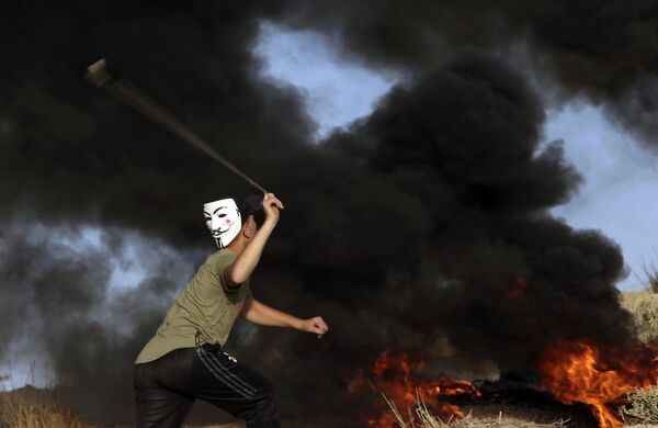 تظاهرکنندگان فلسطینی در مرز نوار غزه و اسرائیل - اسپوتنیک ایران  