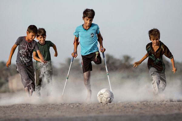 عکاس عراقی در بخش ورزش - اسپوتنیک ایران  