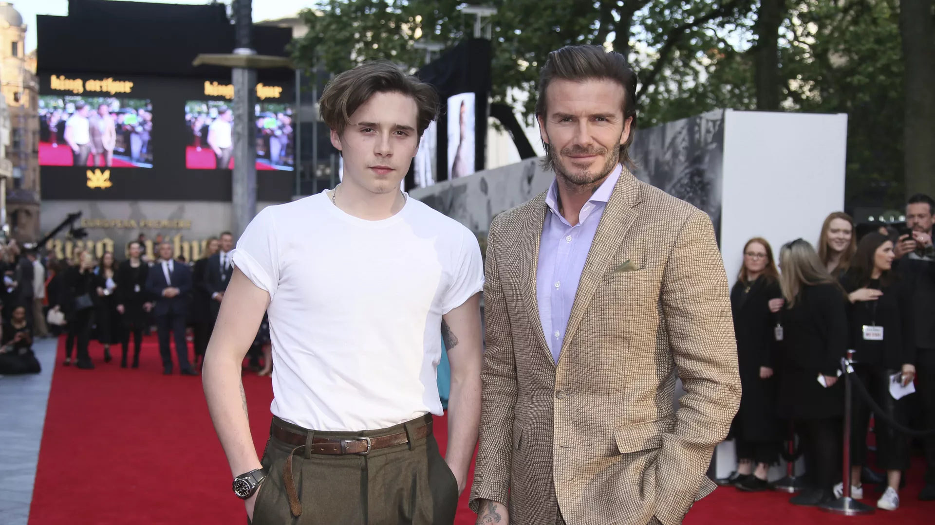 Actor David Beckham, right, poses with his son Brooklyn Beckham for photographers upon arrival at the premiere of the film 'King Arthur The Legend Of The Sword'', in London, Wednesday, May 10, 2017 Actor David Beckham, right, poses with his son Brooklyn Beckham for photographers upon arrival at the premiere of the film 'King Arthur The Legend Of The Sword'', in London, Wednesday, May 10, 2017 - اسپوتنیک ایران , 1920, 13.04.2022