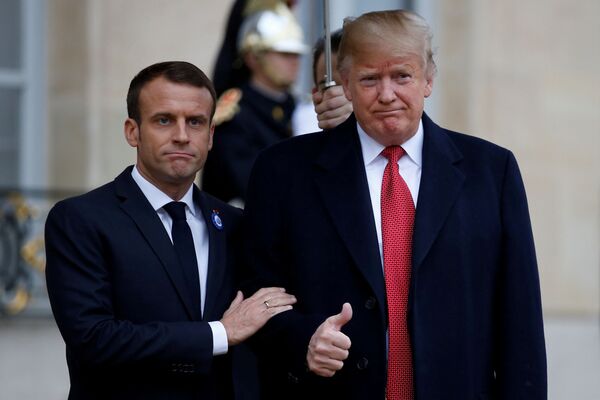 دونالد ترامپ و امانوئل ماکرون، روسای جمهور آمریکا و فرانسه در پاریس - اسپوتنیک ایران  