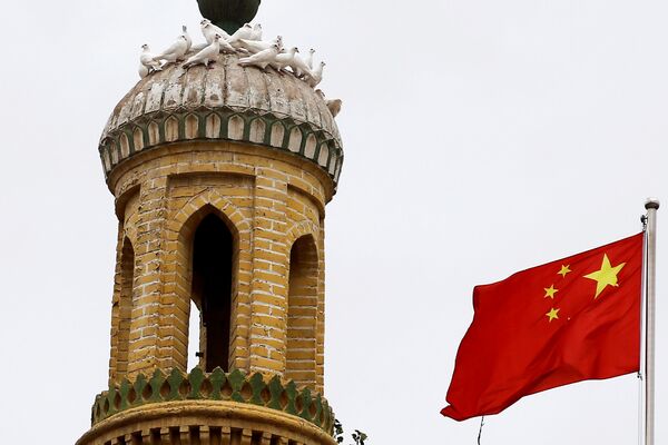 پرچم چین درکاشگار ، منطقه خودمختار اویگور چین - اسپوتنیک ایران  