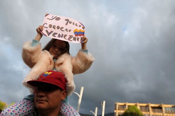 میتینگ در حمایت گویدو رهبر اپوزیسیون ونزوئلا علیه دولت رئیس جمهور در کاراکاس - اسپوتنیک ایران  