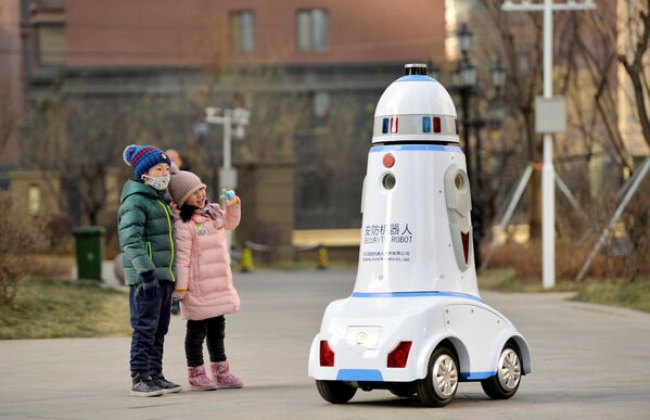 بچه ها و ربات در چین - اسپوتنیک ایران  