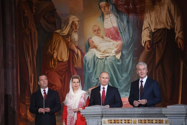 ولادیمیر پوتین در مراسم عید پاک در کلیسای منجی مقدس در مسکو - اسپوتنیک ایران  
