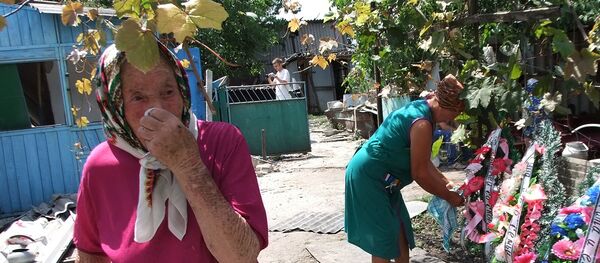 مراسک بخاکسپاری کشته شدگان دونتسک مراسک بخاکسپاری کشته شدگان دونتسک - اسپوتنیک ایران