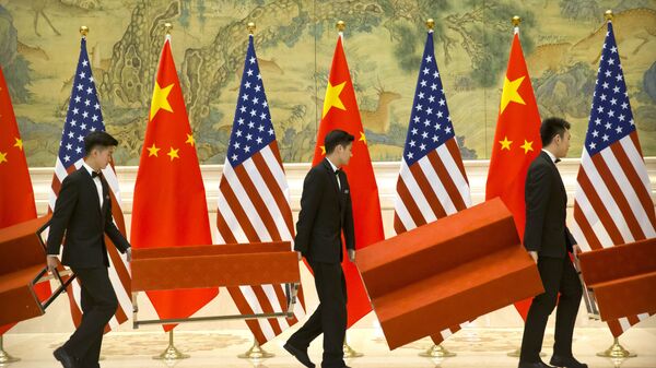 آمریکا، 7 شرکت چینی دیگر را به لیست سیاه تحریم علیه پکن افزود - اسپوتنیک ایران  