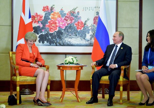 دیدار ولادیمیر پوتین، رئیس جمهور روسیه و ترزا می، نخست وزیر بریتانیا در حاشیه نشست G20 در هانگژو، چین - اسپوتنیک ایران  
