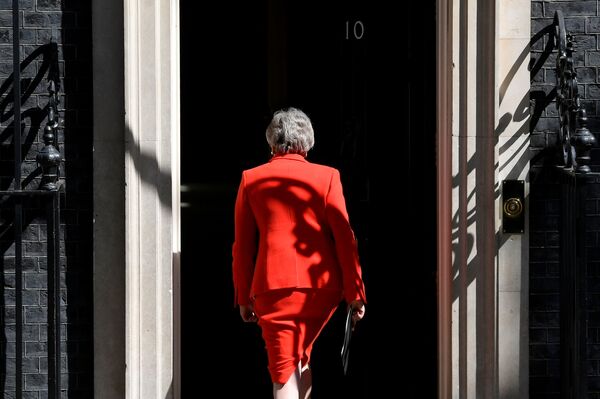 ترزا می، نخست وزیر بریتانیا پس از اعلام استعفا – لندن - اسپوتنیک ایران  