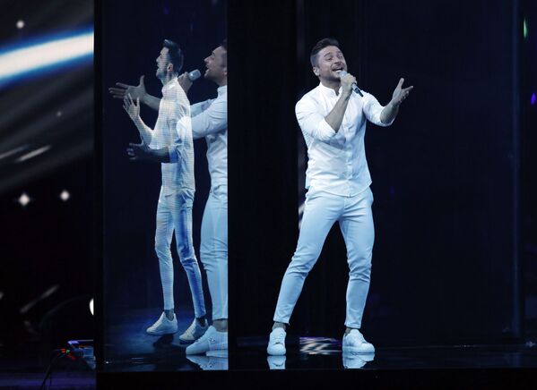 سرگی لازاریف خواننده روسیه با ترانه « فریاد» در فینال کنکور «یوروویژن» در اسرائیل - اسپوتنیک ایران  