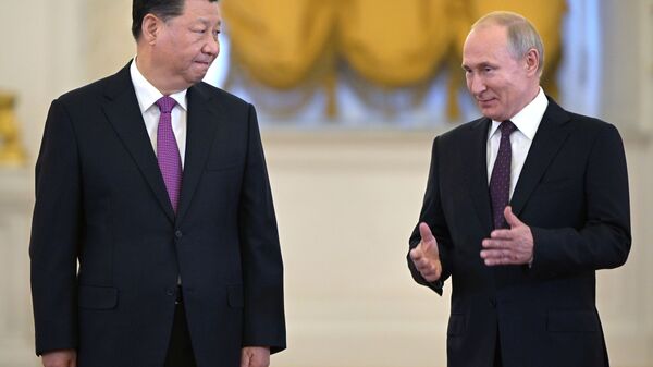 تاکید روسیه و چین بر لزوم دفاع از همکاری با ایران - اسپوتنیک ایران  