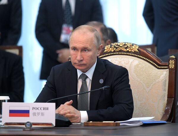 ولادیمیر پوتین، رئیس جمهور روسیه در حاشیه نشست سران کشورهای عضو سازمان همکاری شانگهای - اسپوتنیک ایران  
