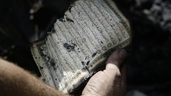 کشف یکی از قدیمی ترین قرآن ها در بریتانیا - اسپوتنیک ایران  
