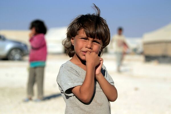 کودکان در سوریه از سال 2011 در زیر سایه جنگ هستند - اسپوتنیک ایران  