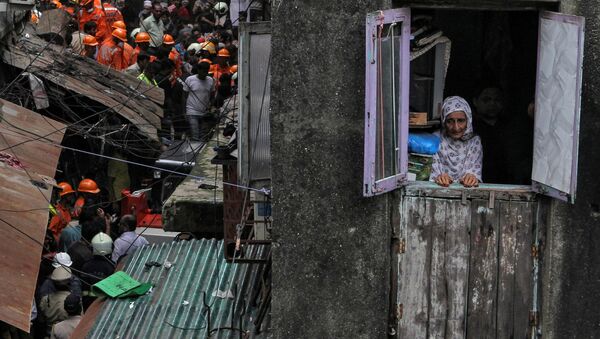 فروریختن ساختمان در هند حادثه آفرید؛ ۲۰۰ نفر زیر آوار+ تصاویر
 - اسپوتنیک ایران  