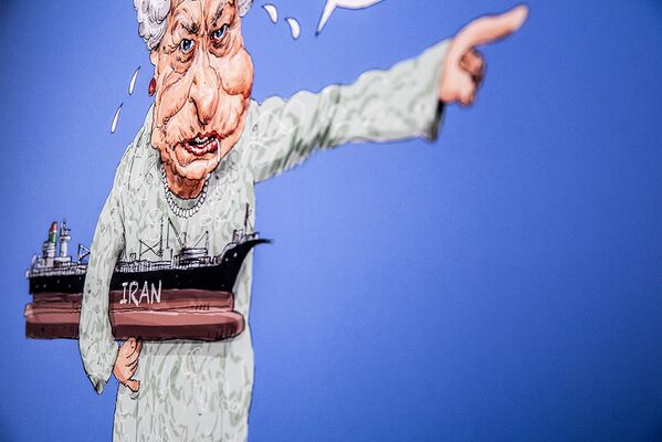نمایشگاه کاریکاتور ملکه کشتی‌رُبا در تهران - اسپوتنیک ایران  