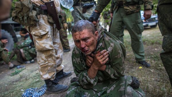 سرباز اوکراینی اسارت گرفته شده در جریان مبارزه در شهر شاخترسک - اسپوتنیک ایران  