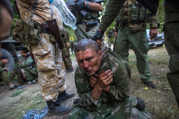 سرباز اوکرایتی اسارت گرفته شده در جریان مبارزه در شهر شاخترسک - اسپوتنیک ایران  