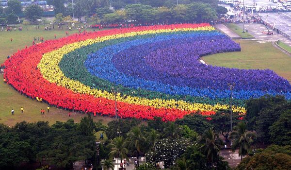 جالب ترین رکوردهای گینس - رنگین کمان با شرکت 31000 نفر در فیلیپین - اسپوتنیک ایران  