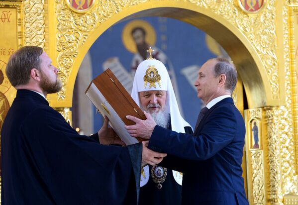 ولادیمیر پوتین رئیس جمهور روسیه و اسقف اعظم سراسر روسیه - اسپوتنیک ایران  
