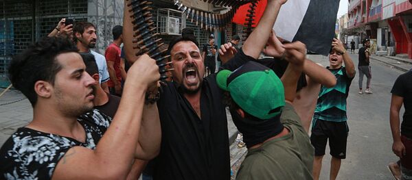 رسانه‌ها از سرکوب معترضین در عراق خبر دادند - اسپوتنیک ایران  