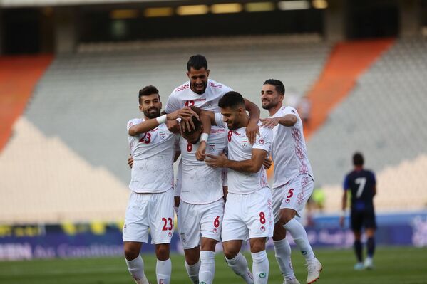 بازیکنان فوتبال در مسابقات جام جهانی بین تیم های مراکش و ایران
 - اسپوتنیک ایران  
