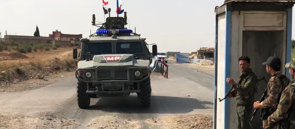 گشت زنی پلیس نظامی روسیه در مرز سوریه و ترکیه گشت زنی پلیس نظامی روسیه در مرز سوریه و ترکیه - اسپوتنیک ایران