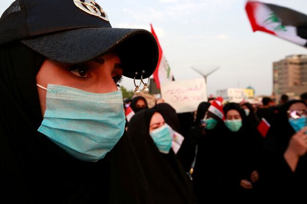 اعتراضات گسترده ضد دولتی در عراق به روایت تصویر  - اسپوتنیک ایران  