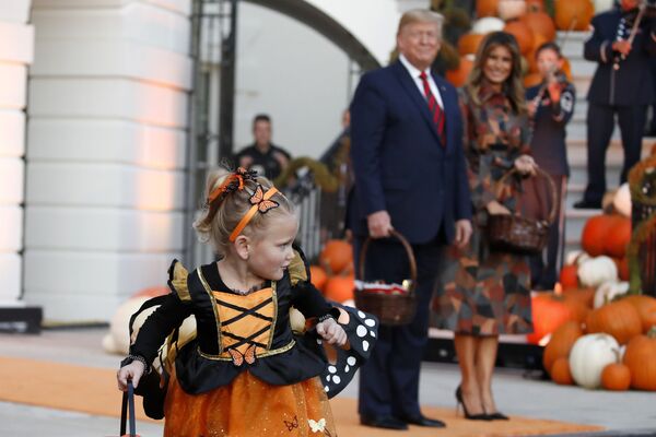 دونالد ترامپ به همراه همسرش در جشن هالووین کاخ سفید - اسپوتنیک ایران  
