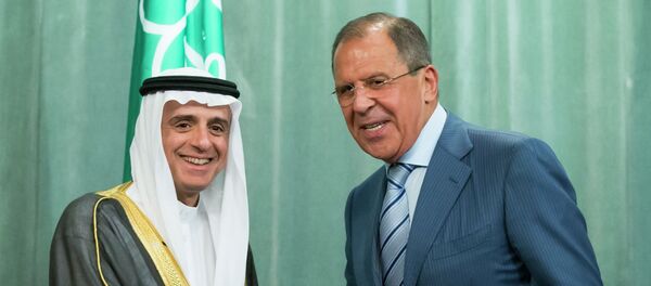 Russian Foreign Minister, Sergey Lavrov, right, and Saudi Arabia Foreign Minister, Adel bin Ahmed Al-Jubeir, shake hands after a news conference following their meeting in Moscow, Russia, Tuesday, Aug. 11, 2015 - اسپوتنیک ایران  