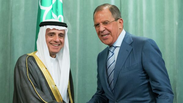 Russian Foreign Minister, Sergey Lavrov, right, and Saudi Arabia Foreign Minister, Adel bin Ahmed Al-Jubeir, shake hands after a news conference following their meeting in Moscow, Russia, Tuesday, Aug. 11, 2015 - اسپوتنیک ایران  