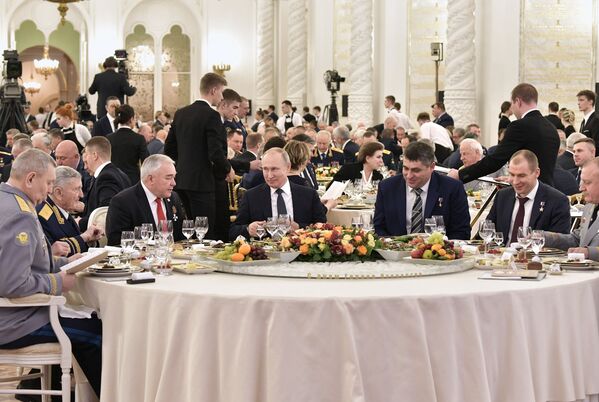 ولادیمیر پوتین رئیس جمهور روسیه در مراسم سنتی سالانه در کرملین به مناسبت روز قهرمانان میهنی 
 - اسپوتنیک ایران  